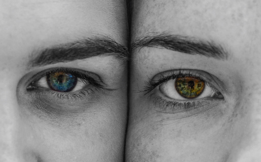 Two faces with different color eyes