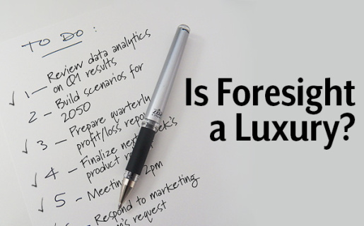 A paper with words and a pen with text over laid that says "Is foresight a luxury?"