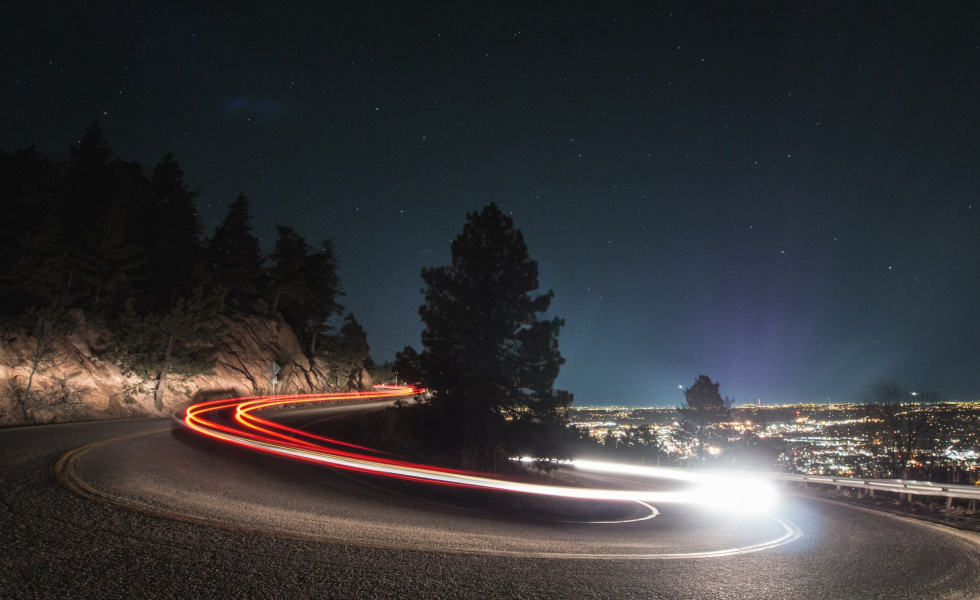 night time with a time lapse of a vehicle driving fast