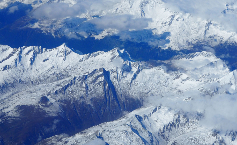 mountain range in the blue sky